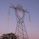 Image for article titled These Beautiful Giant Sculptures Support Power Lines With Style